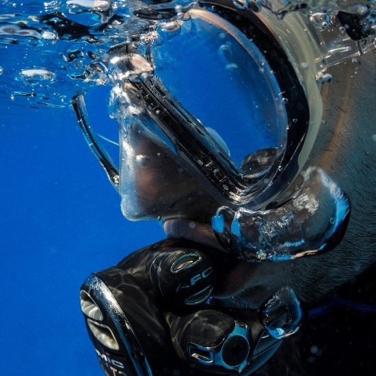 side view of scuba diver with mask on